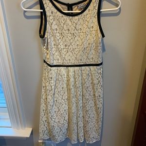 Nude/cream color dress with a flower and mesh